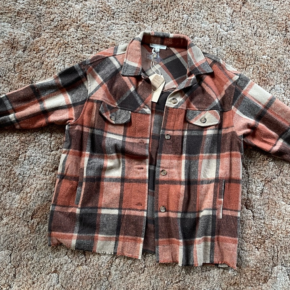 FSL size small brushed flannel with fringe.